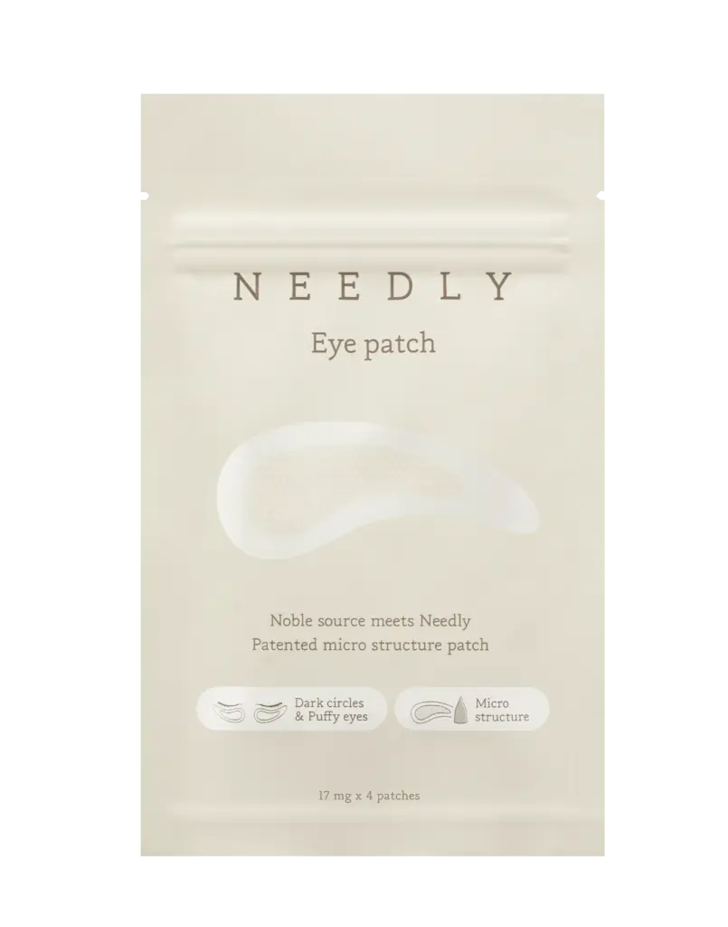 Pakiranje Needly Eye Patch s oznakama koje naglašavaju korejske kozmetičke inovacije 'divote cosmetics'; dizajnirano za smanjenje tamnih podočnjaka i natečenosti oko očiju pomoću patentirane mikrostrukture.