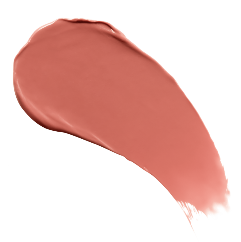 A smooth, large swatch of peach-colored lipstick against a black background.